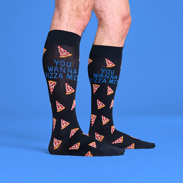 Men’s Compression Socks in “Pizza” in black worn on foot.