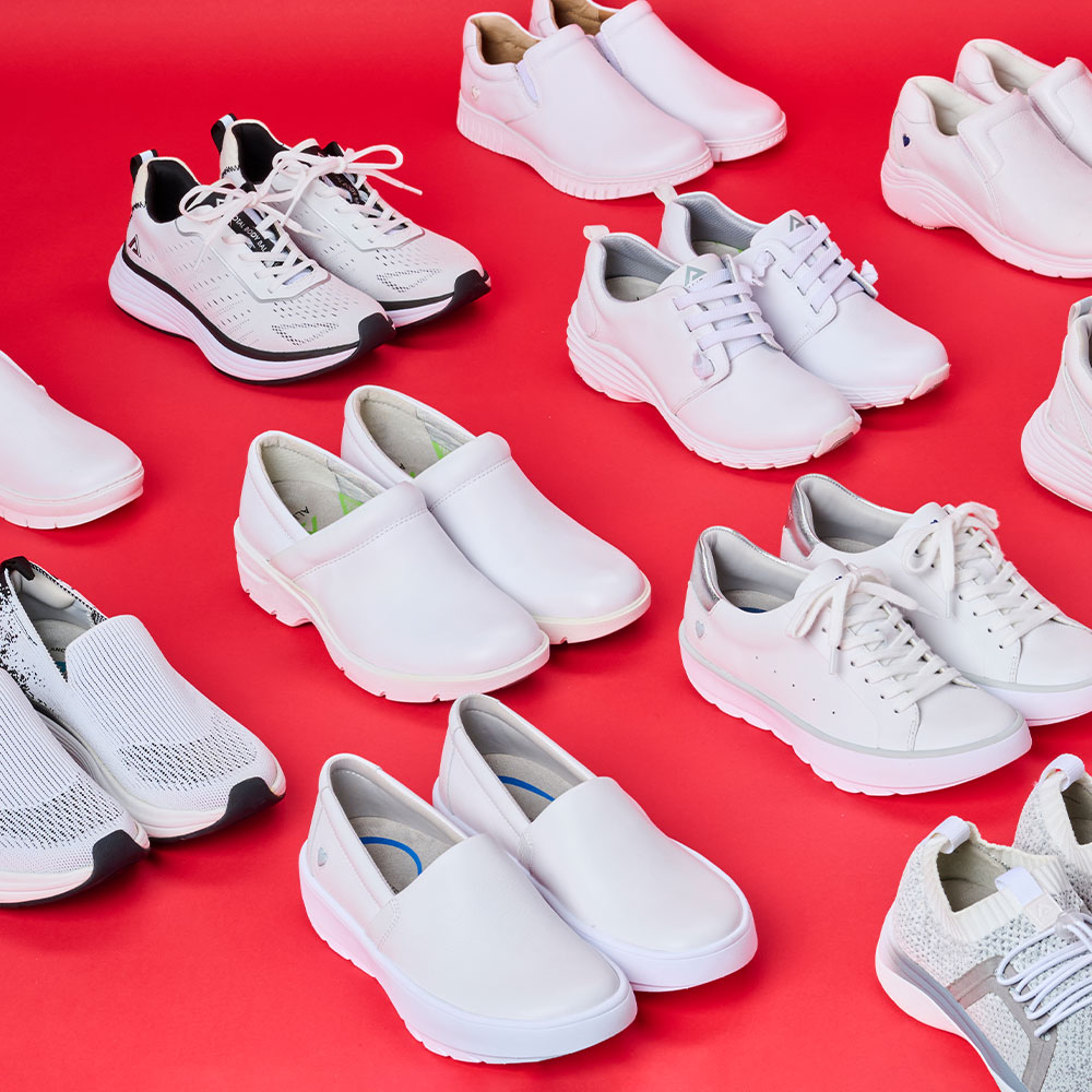 Lots of Women’s white shoes shown in diagonal rows on a red background.